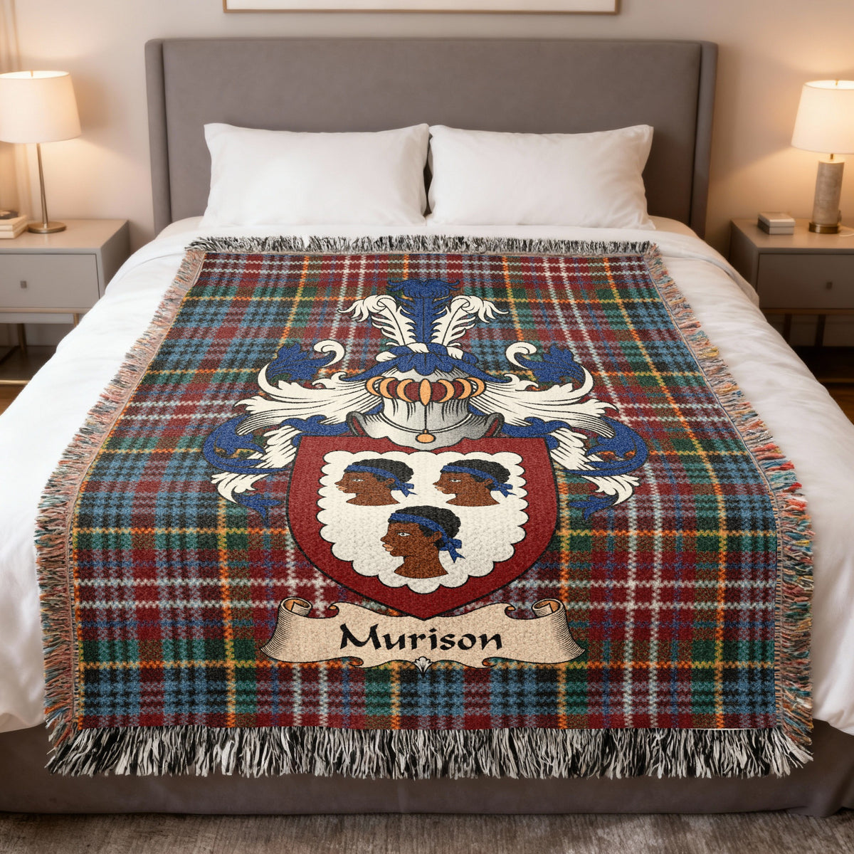 Murison family crest emblem on a Caledonia tartan woven blanket