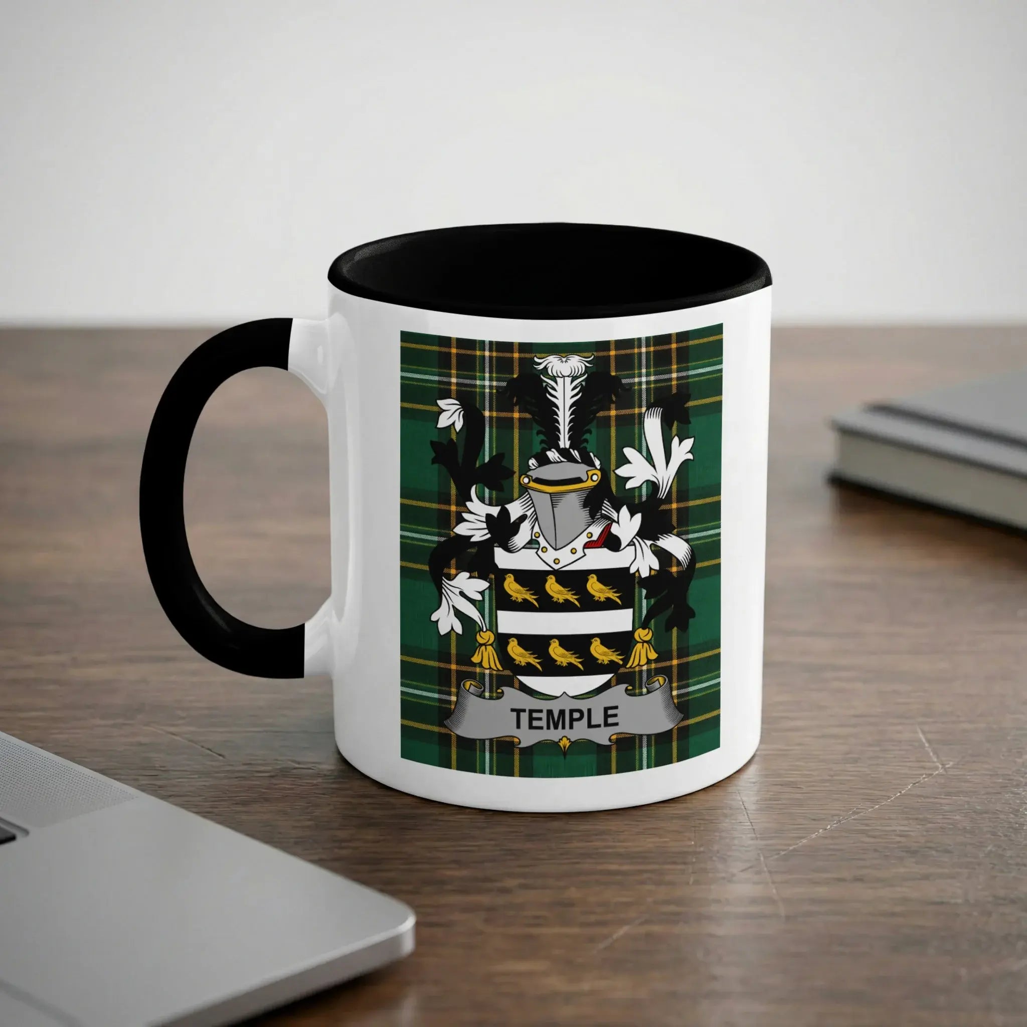 White mug with black handle featuring a green tartan crest with "Temple" text.