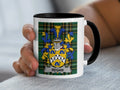Regan Irish family crest black accent mug with Irish National Tartan