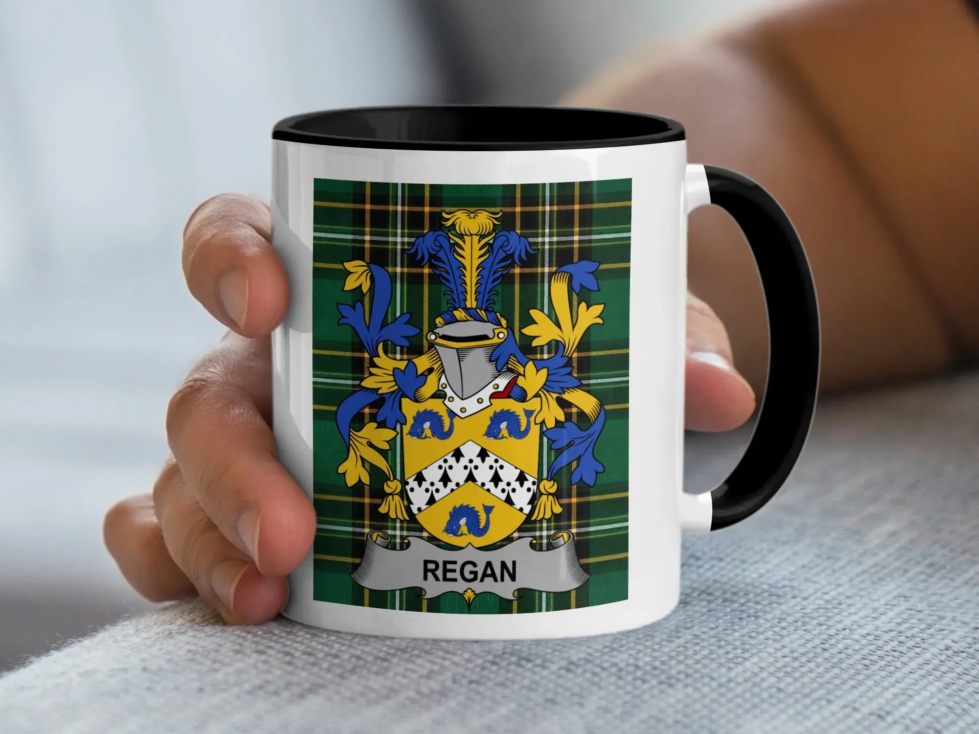 Regan Irish family crest black accent mug with Irish National Tartan