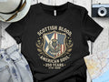 Black t-shirt with Scottish and American flag design and "Scottish Blood, American Soul" text.
