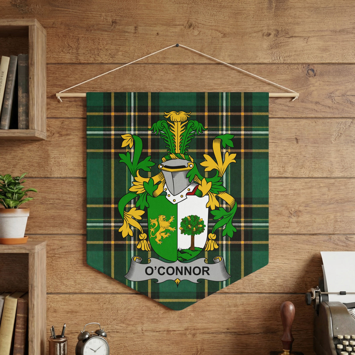 O'Connor family crest on green tartan banner hanging on wooden wall.