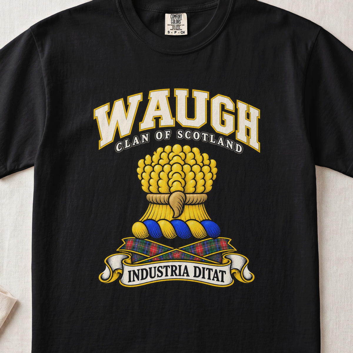Waugh Scottish clan T-shirt in Black, front view with a gold sheaf of wheat and motto banner.