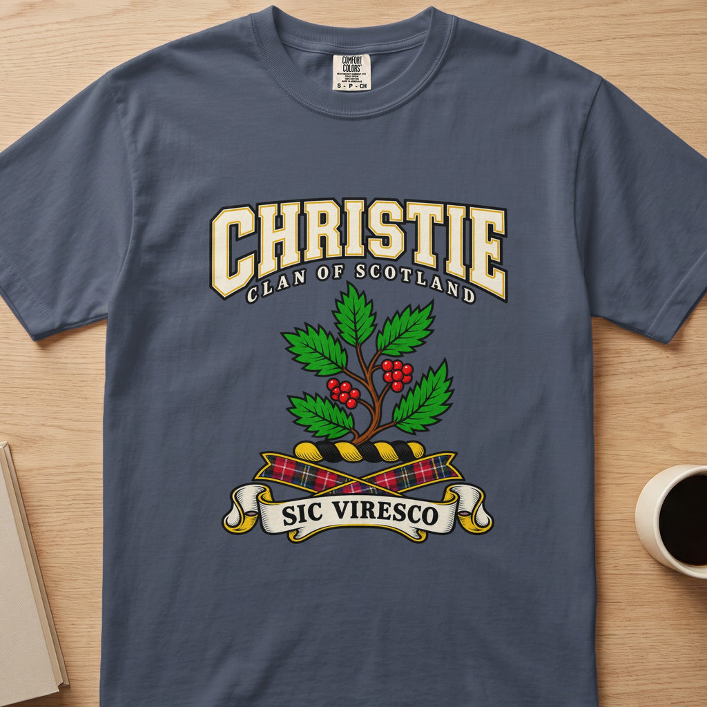 Christie clan T-shirt in slate blue, front view with green leafy branch with red berries