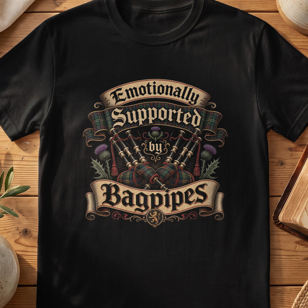 Black Gildan 64000 unisex T-shirt flatlay with Emotionally Supported by Bagpipes Scottish graphic design