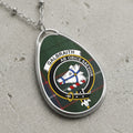 Galbraith clan Scottish tartan necklace with clan crest on tartan background