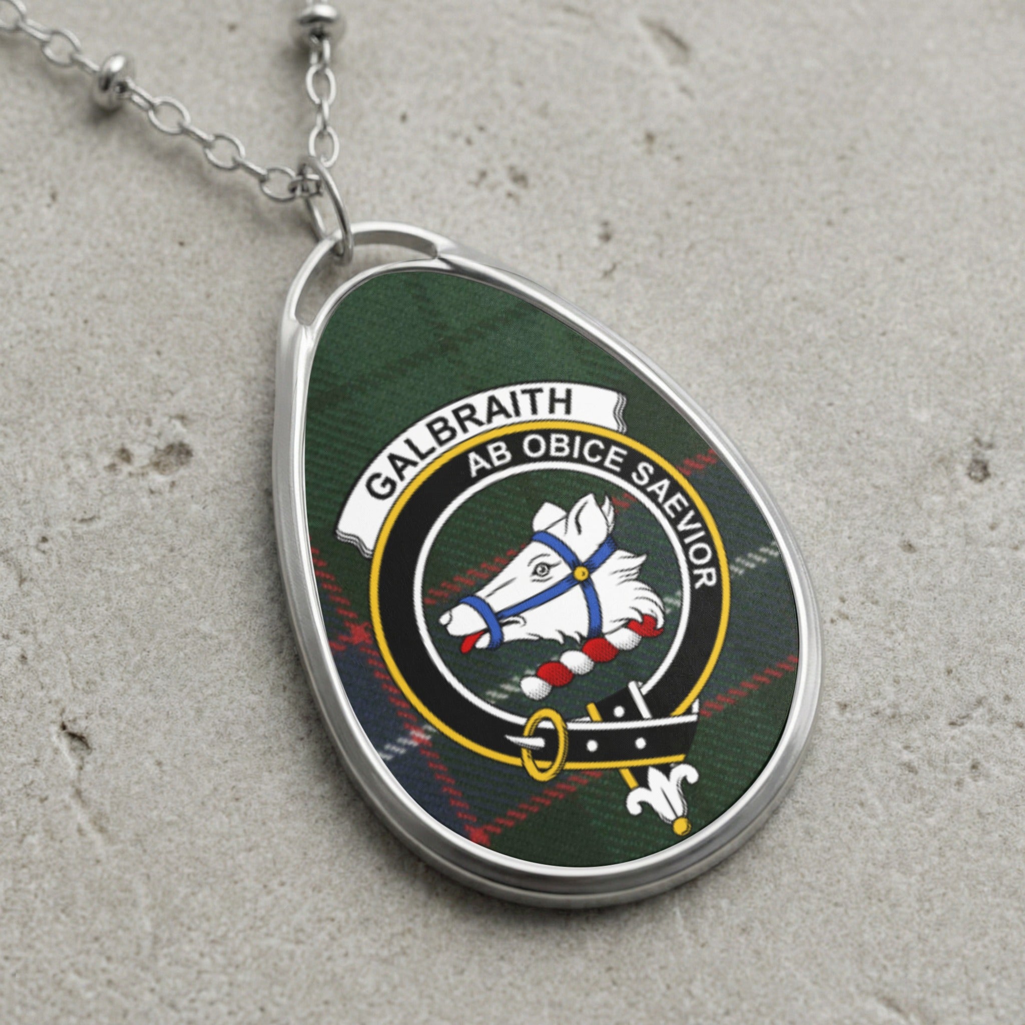 Galbraith clan Scottish tartan necklace with clan crest on tartan background