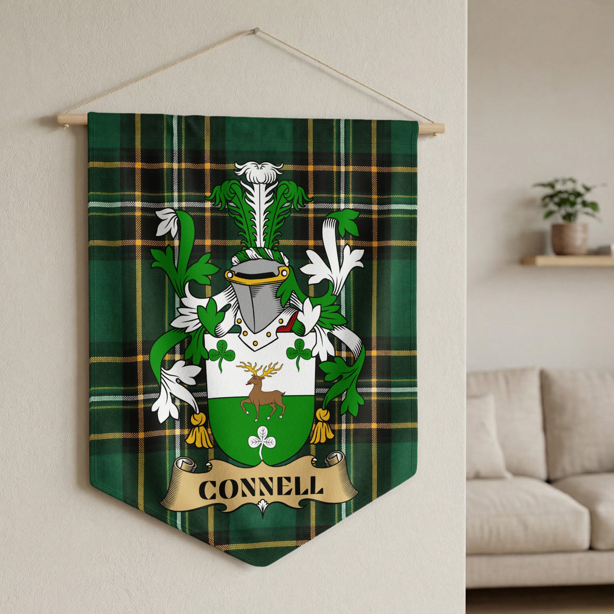 Connell family crest on green tartan banner with a deer and shamrocks.