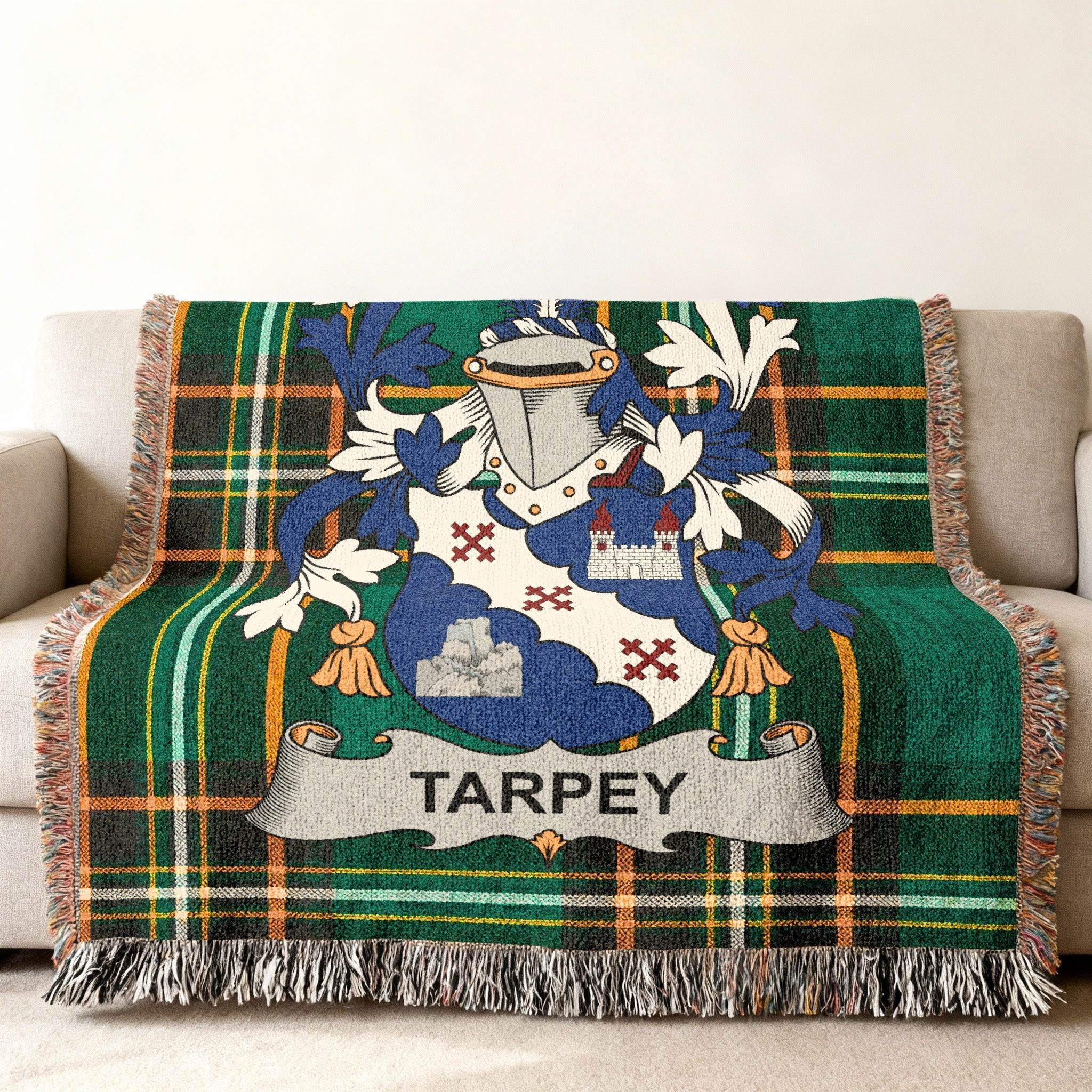 Tartan throw blanket featuring the TARPEY coat of arms in the center.