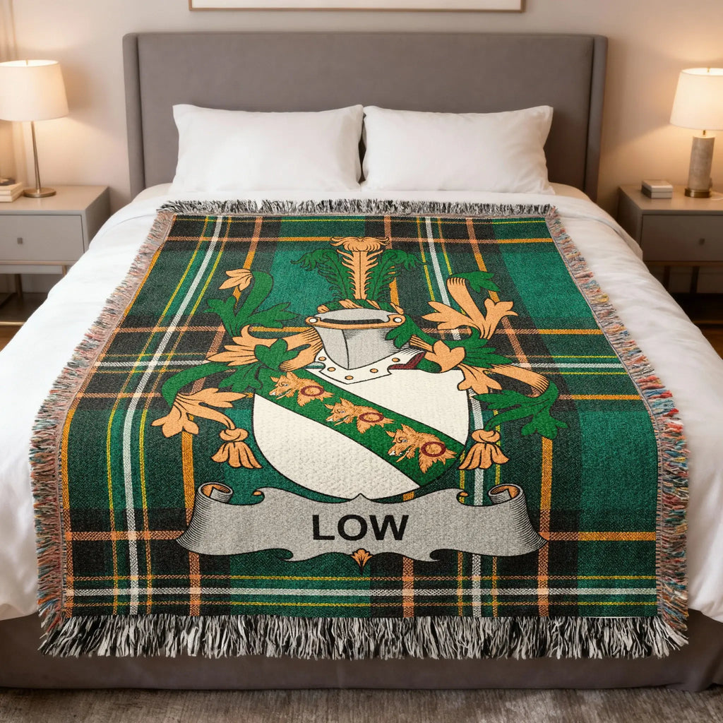 Green plaid blanket with a family crest featuring the name "LOW".