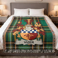 Tartan blanket with a crest displaying the name VIZER.