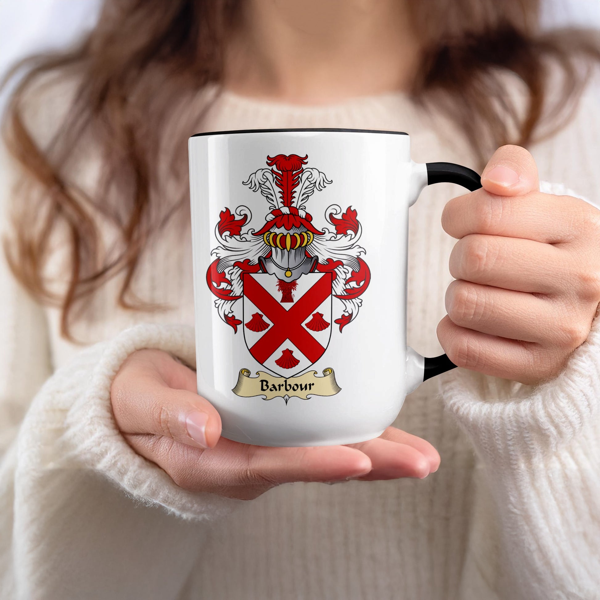 White ceramic mug with black rim, displaying a coat of arms with the name "Barbour".