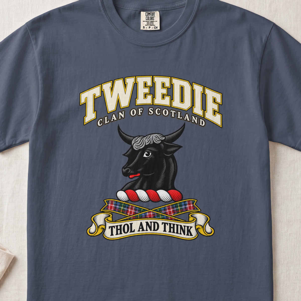Tweedie Scottish clan T-shirt in Midnight, front view with a black bull head and motto design.