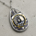 Hannay tartan oval pendant with clan crest and motto "Per Ardua Ad Alta".