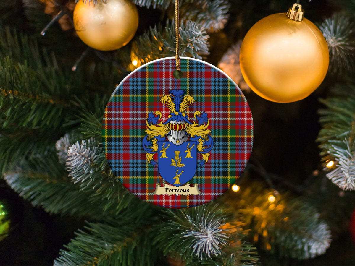 Porteous family emblem ceramic Christmas ornament with Caledonia tartan background in festive holiday décor