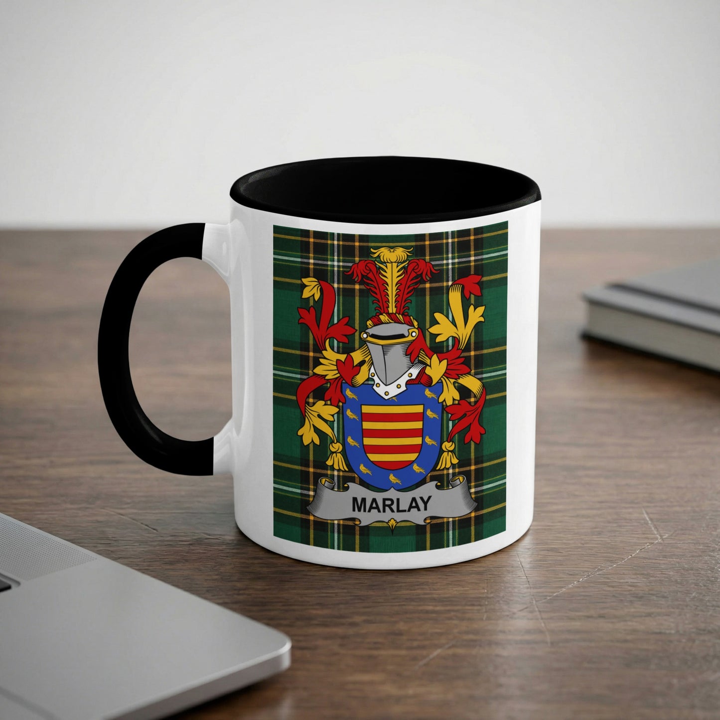 White mug with black handle featuring Marlay family crest on tartan background.
