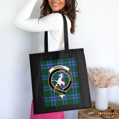 Scottish Clan Riddell Crest on Tartan Background Tote Bag - Living Stone Gifts