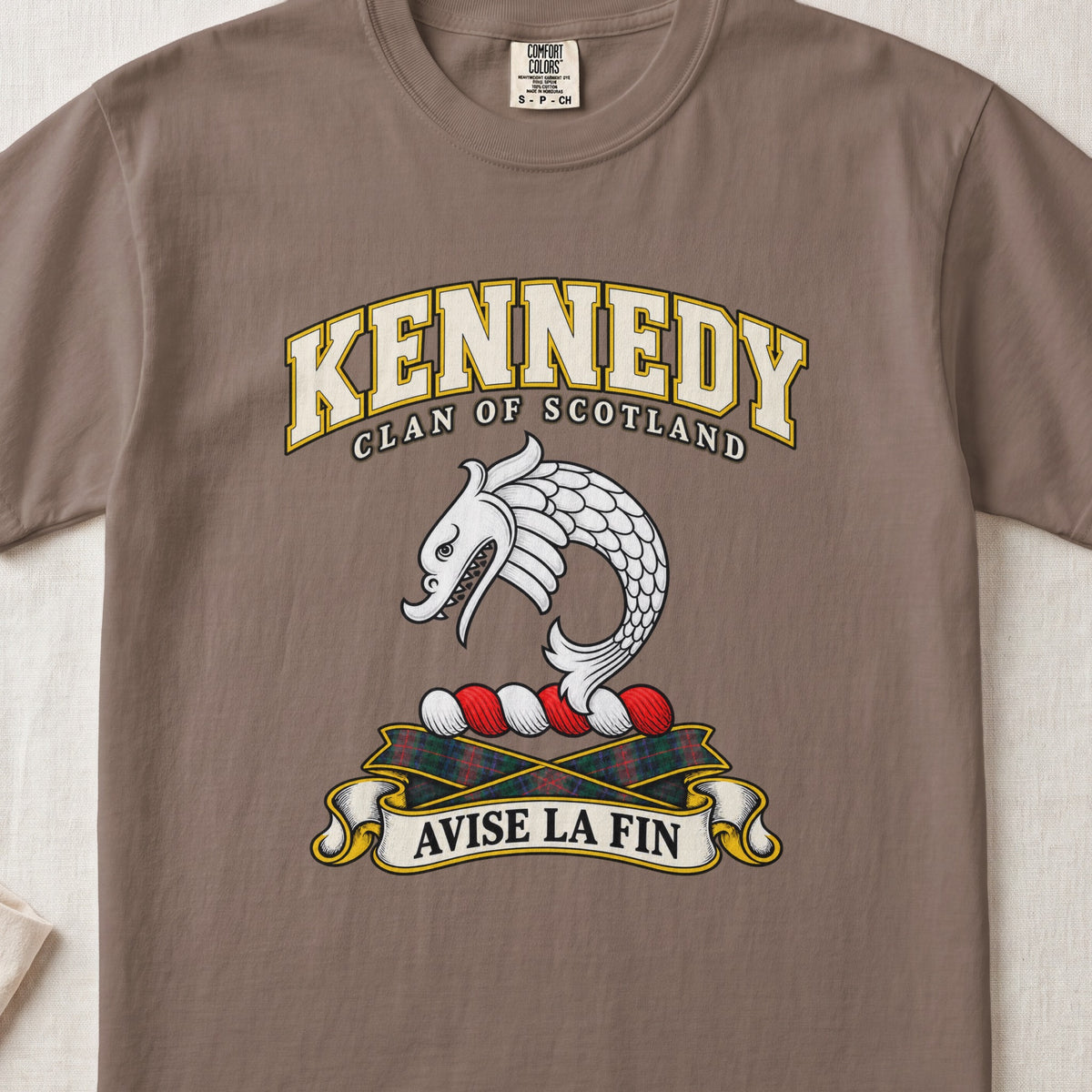 Kennedy Scottish clan T-shirt in Espresso, front view with a curved silver fish motif and motto banner.