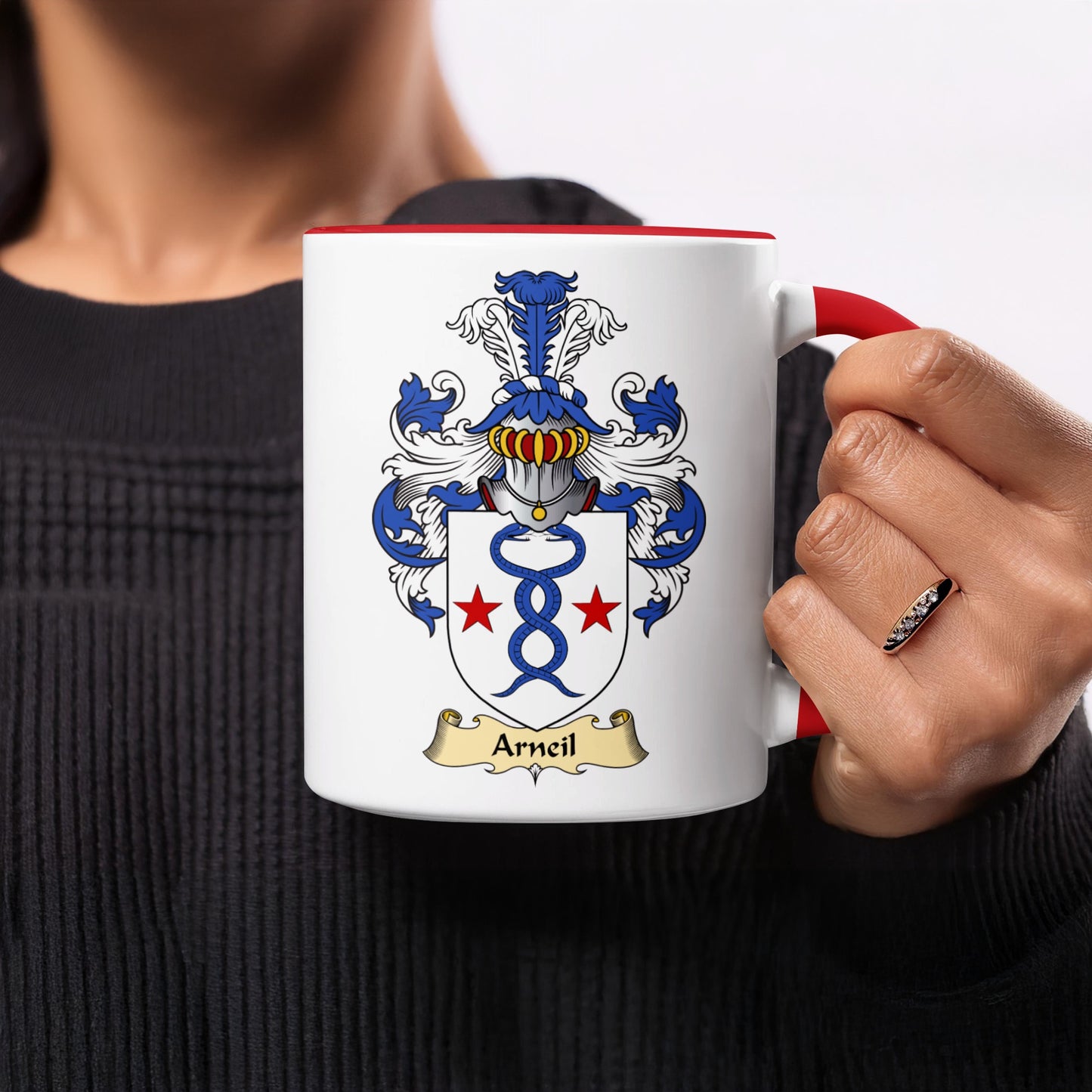 White mug with red handle featuring the Arceil family crest.