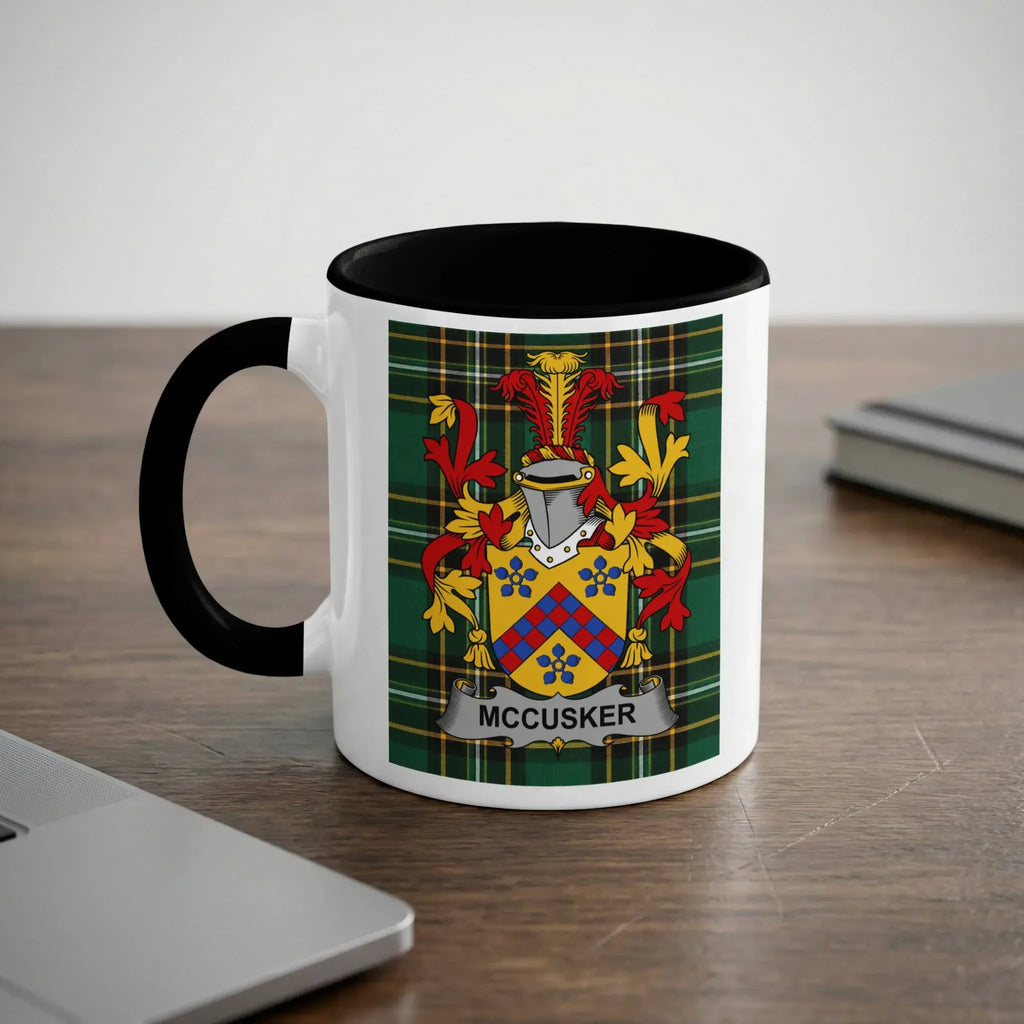 McCusker Irish heritage mug with black handle and family crest