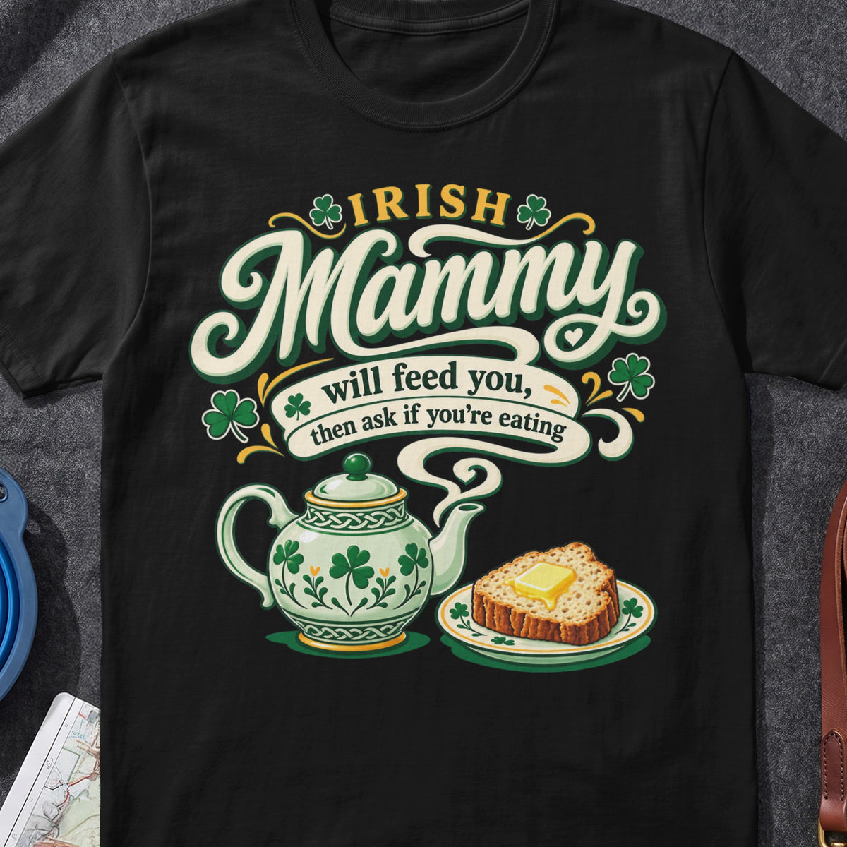 Irish Mammy Will Feed You Irish graphic T-shirt in Black, flat-lay mockup