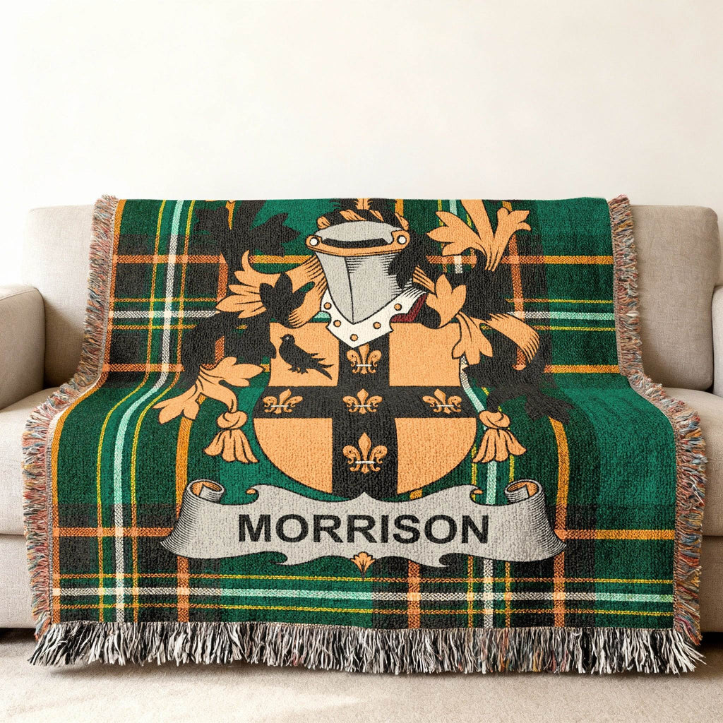 Morrison family crest on a green and black plaid woven blanket.