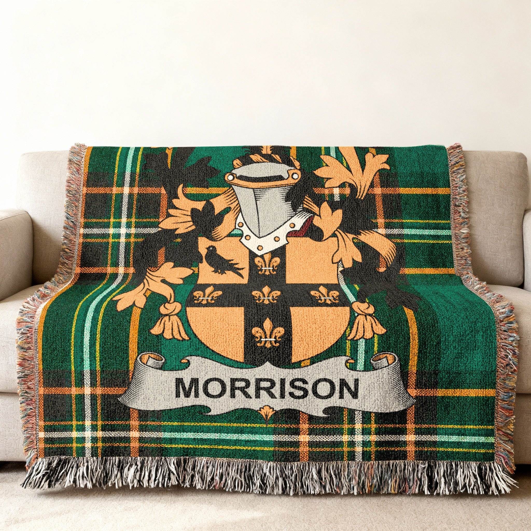 Morrison family crest on a green and black plaid woven blanket.
