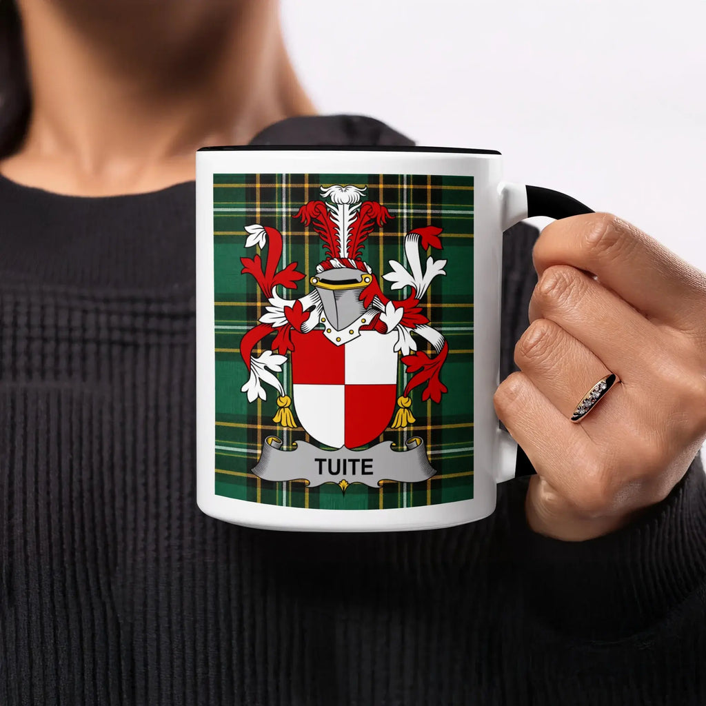 Mug featuring a red and white crest with "TUITE" in text on a tartan background.