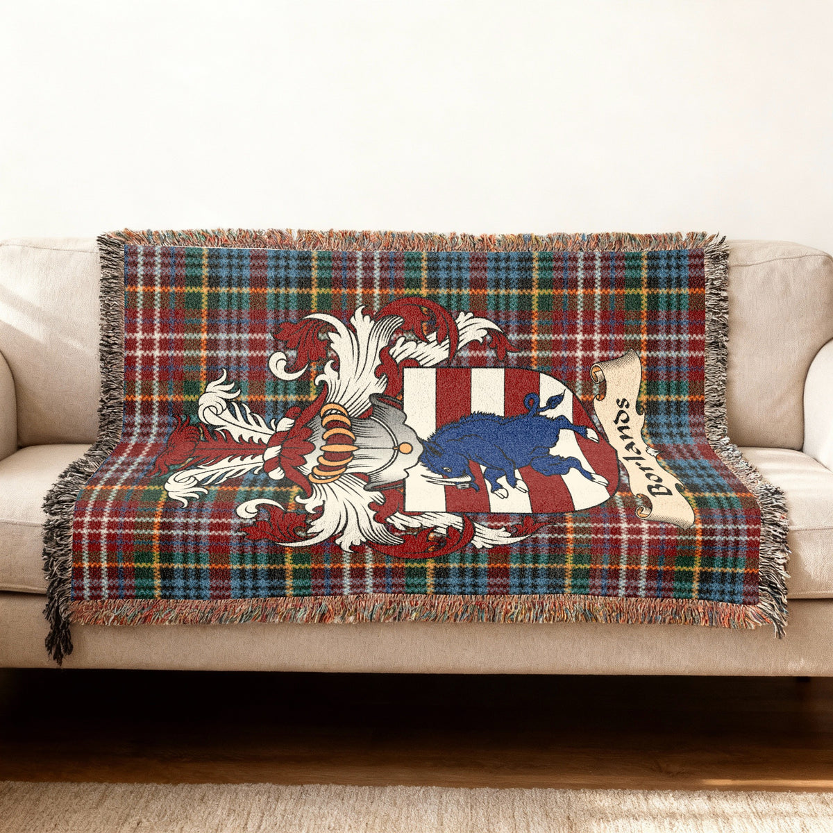 Borlands Scottish woven blanket with family shield and Caledonia tartan background