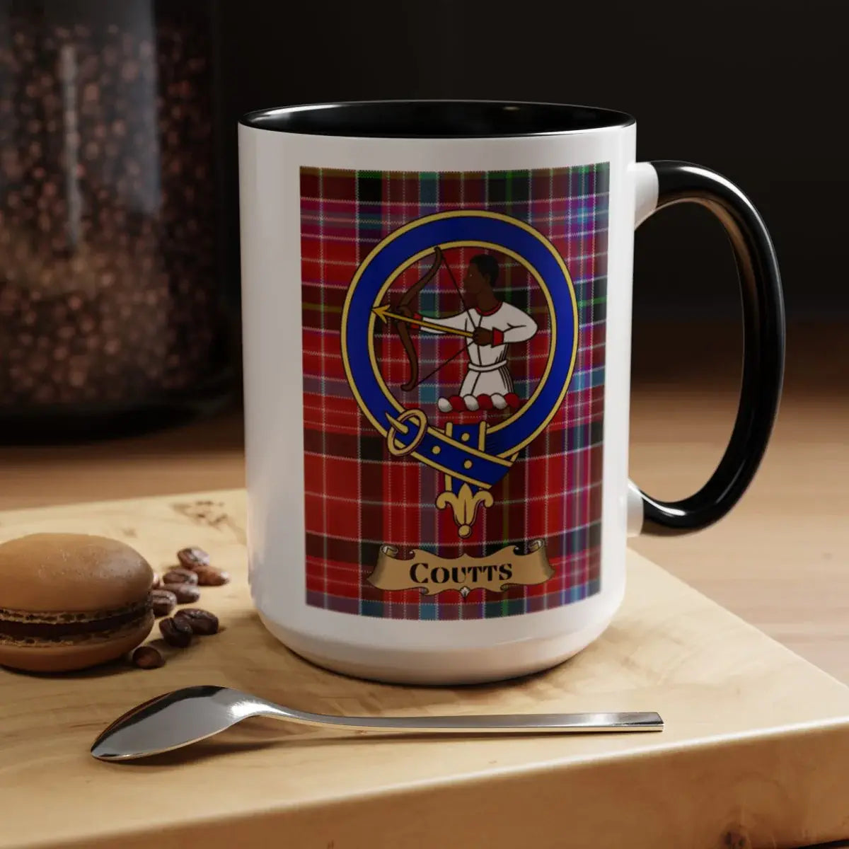 Close-up of the Coutts clan crest printed on a ceramic mug