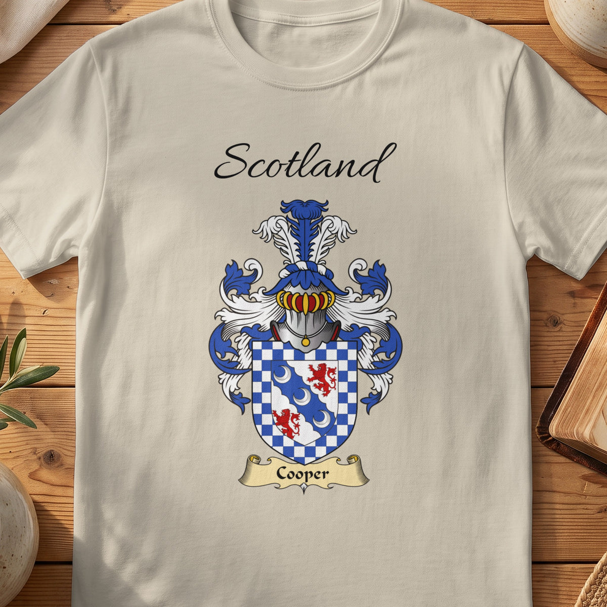 Sand Cooper Scottish family shield T-shirt featuring a blue diagonal band inside a checked border