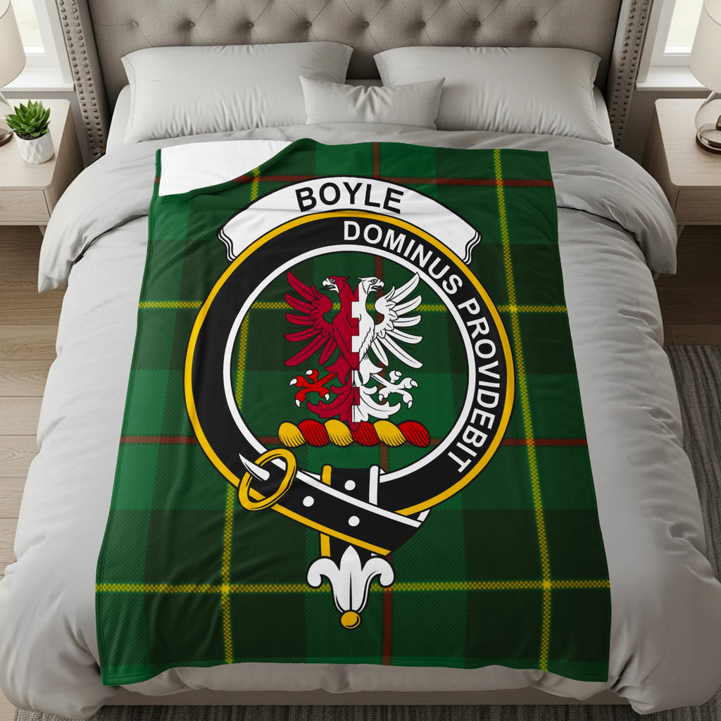 Boyle clan crest with double-headed eagle on tartan throw blanket