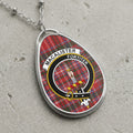 Macalister clan Scottish tartan necklace with clan crest and Fortiter motto on tartan background