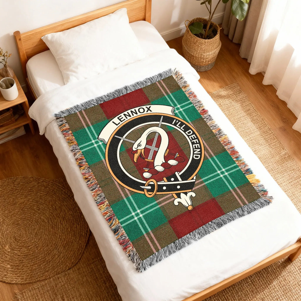 Clan Lennox tartan woven blanket — fringe border detail showing woven pattern and clan crest