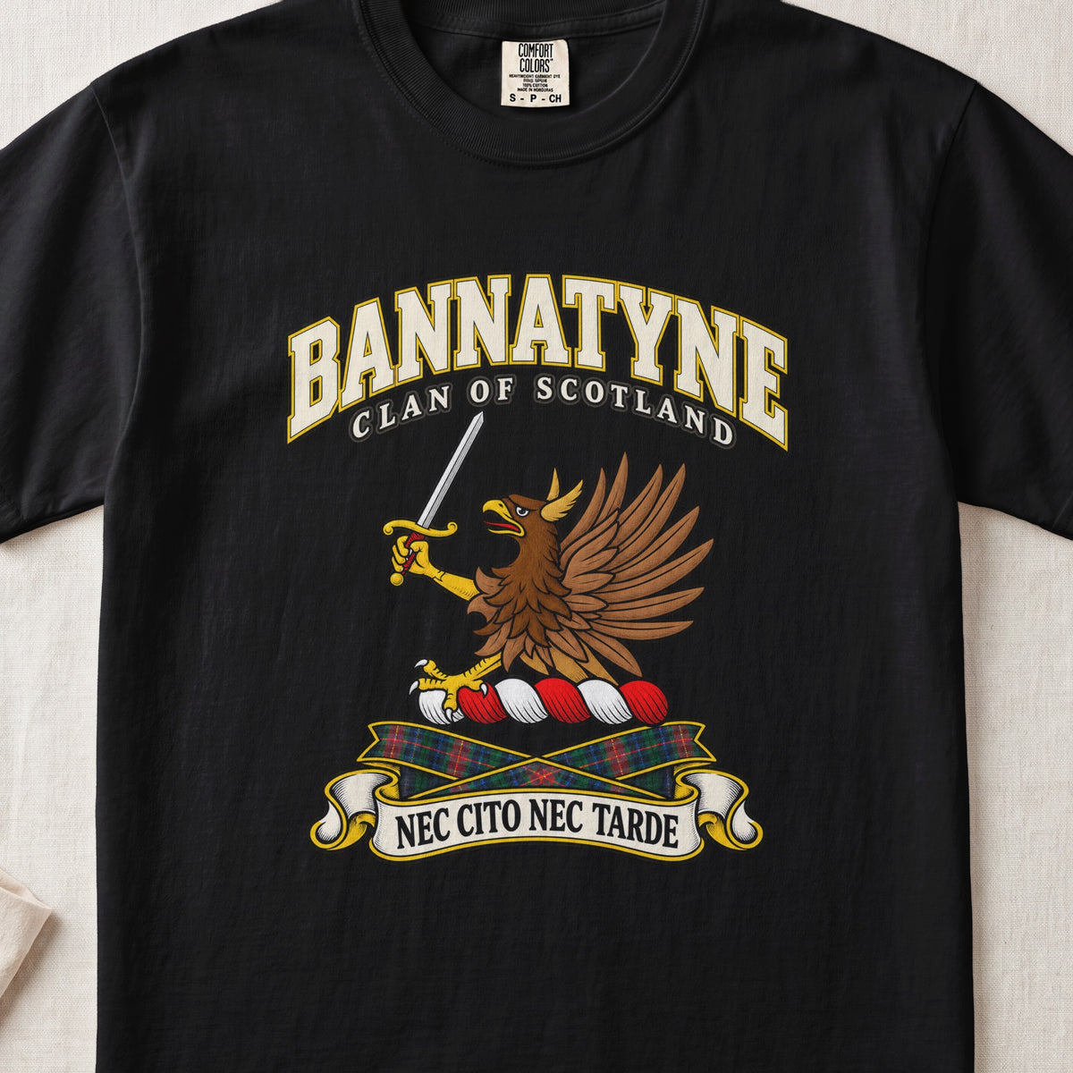 Bannatyne Scottish clan T-shirt in Black, front view with a brown eagle holding a sword and motto design.