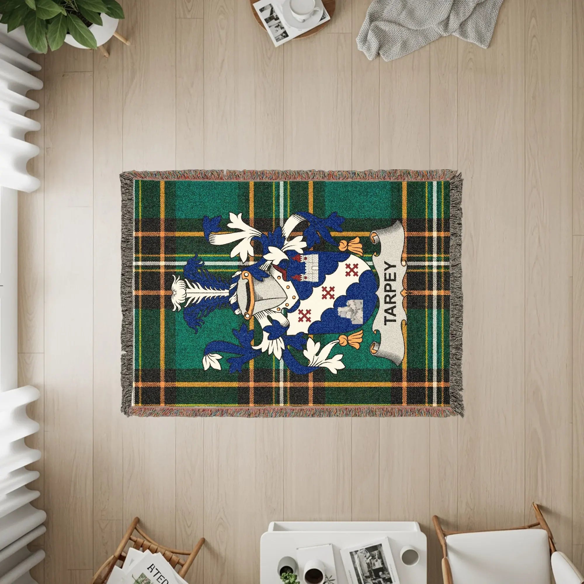 Tapestry featuring the Tarpey family crest on a green tartan background.