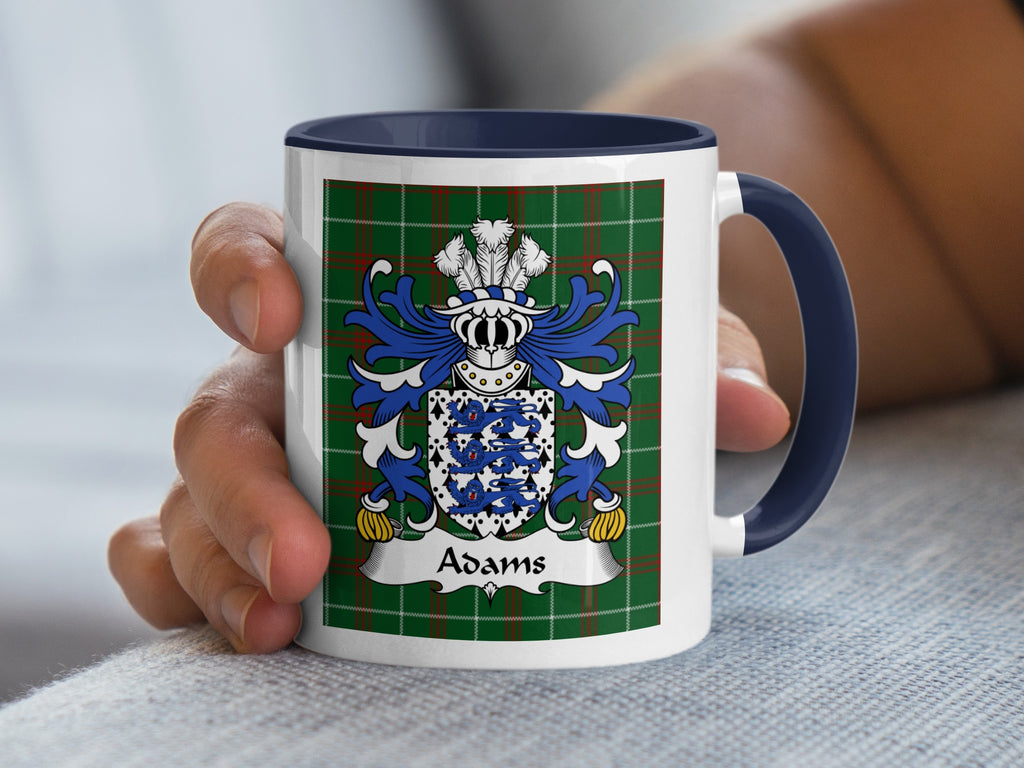 Mug featuring the Adams coat of arms on a green plaid background.