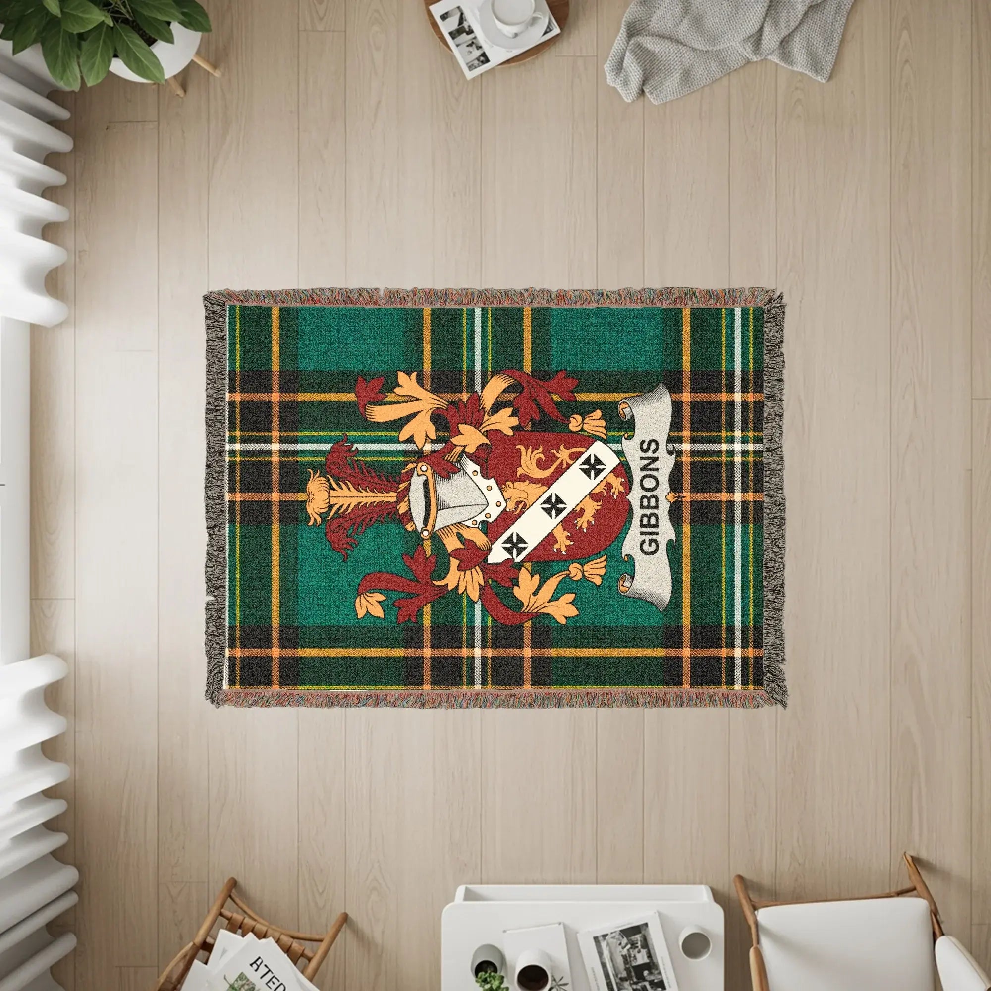 Tartan blanket with Gibbons coat of arms and fringe.