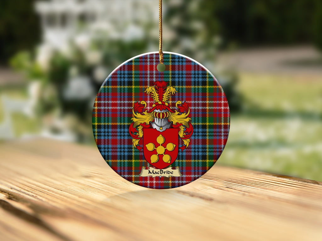 Round MacBride Scottish clan ornament with family crest on a Caledonia tartan background