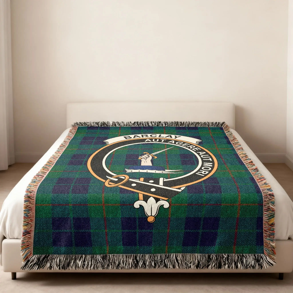 Barclay tartan woven blanket folded — clan crest detail, fringe finish, Scottish heritage design