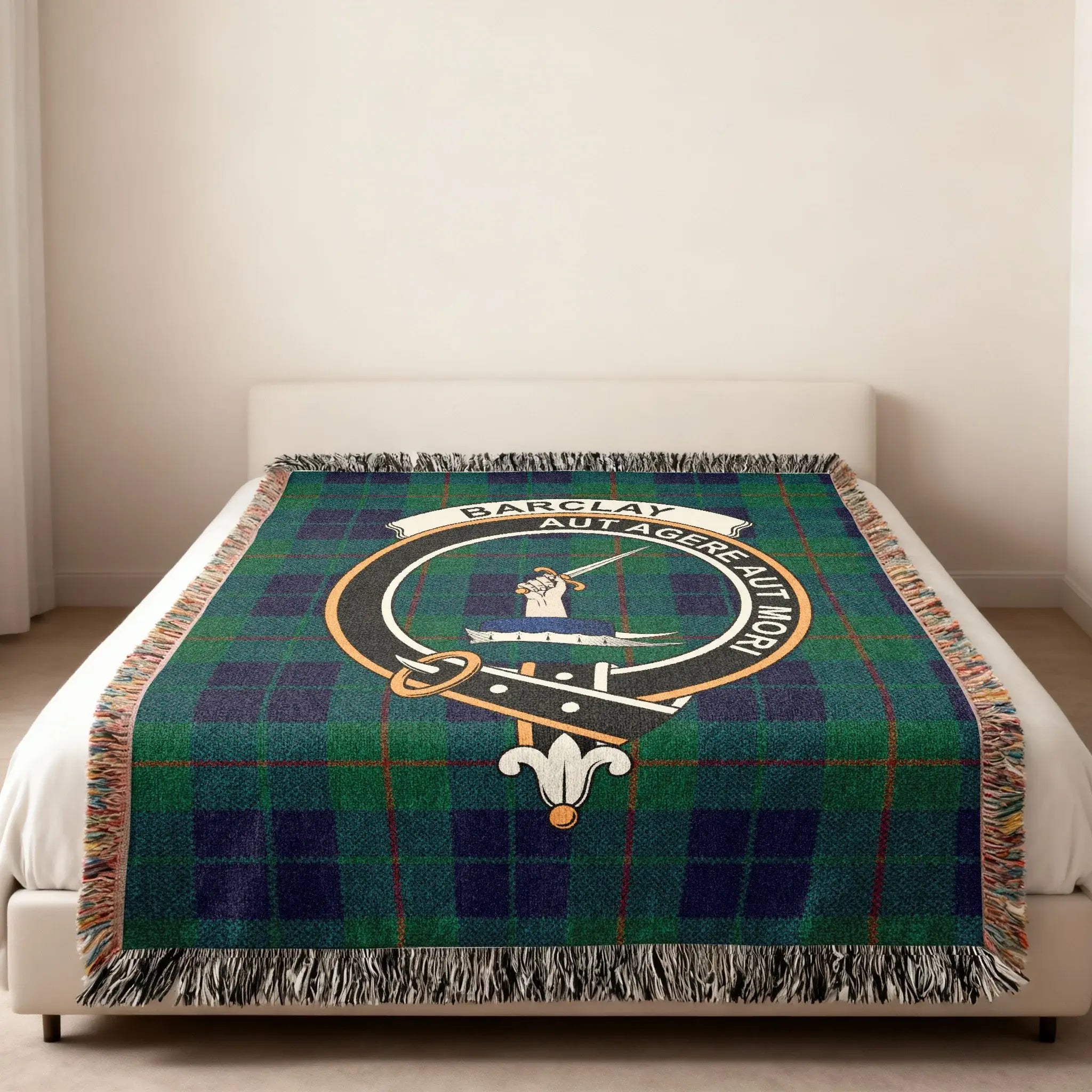 Barclay tartan woven blanket folded — clan crest detail, fringe finish, Scottish heritage design