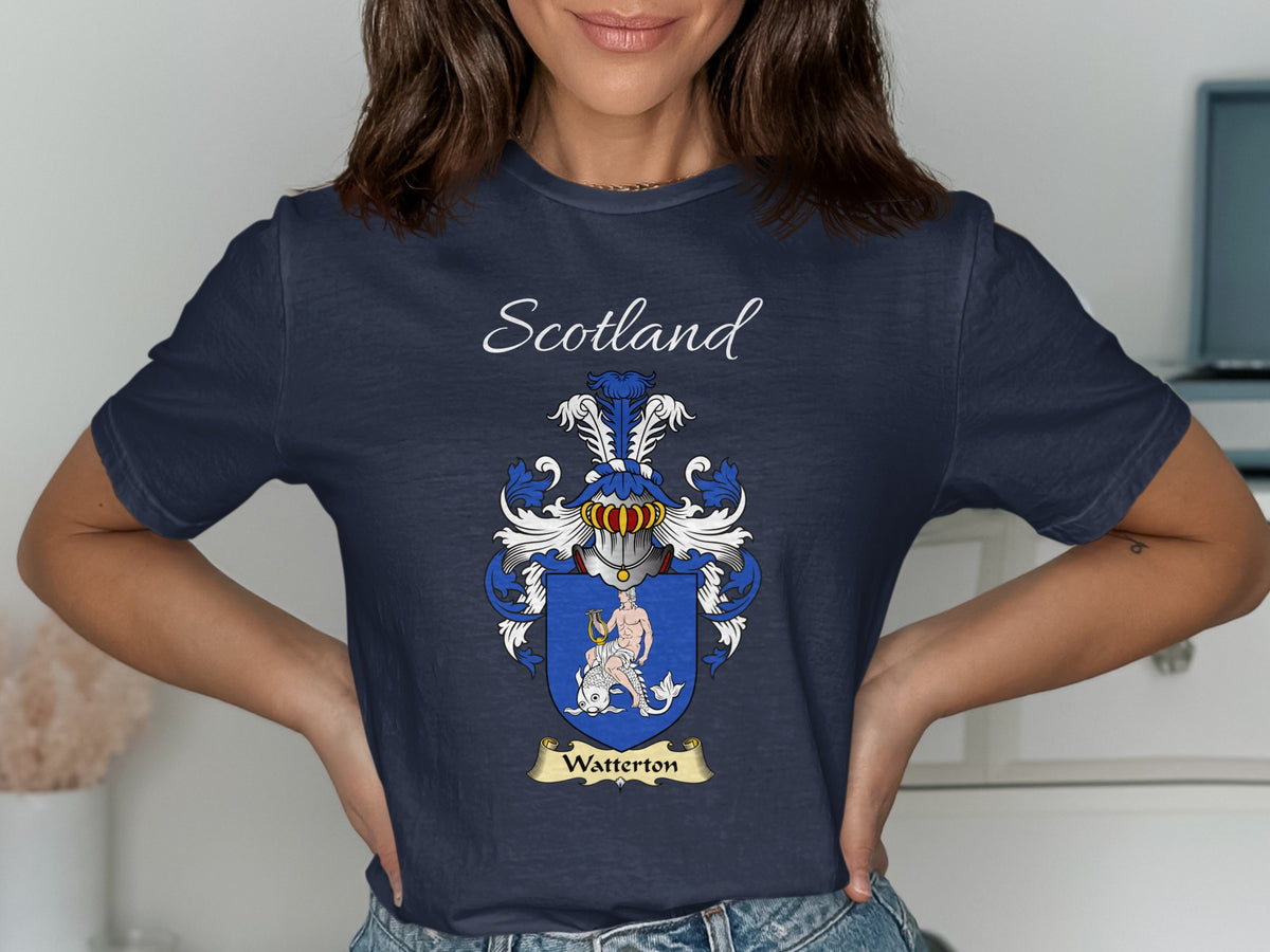 Model wearing the navy Watterton family crest T-shirt featuring “Scotland” and the surname banner.