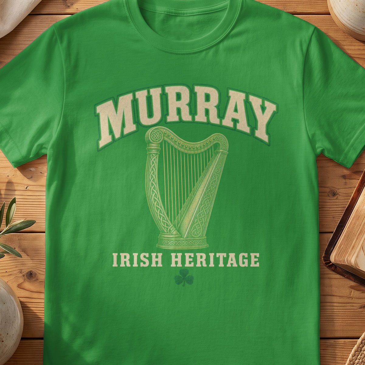Murray Irish harp T-shirt in Irish Green, with cream surname lettering, a gold-toned harp, green shamrock and “Irish Heritage” text.