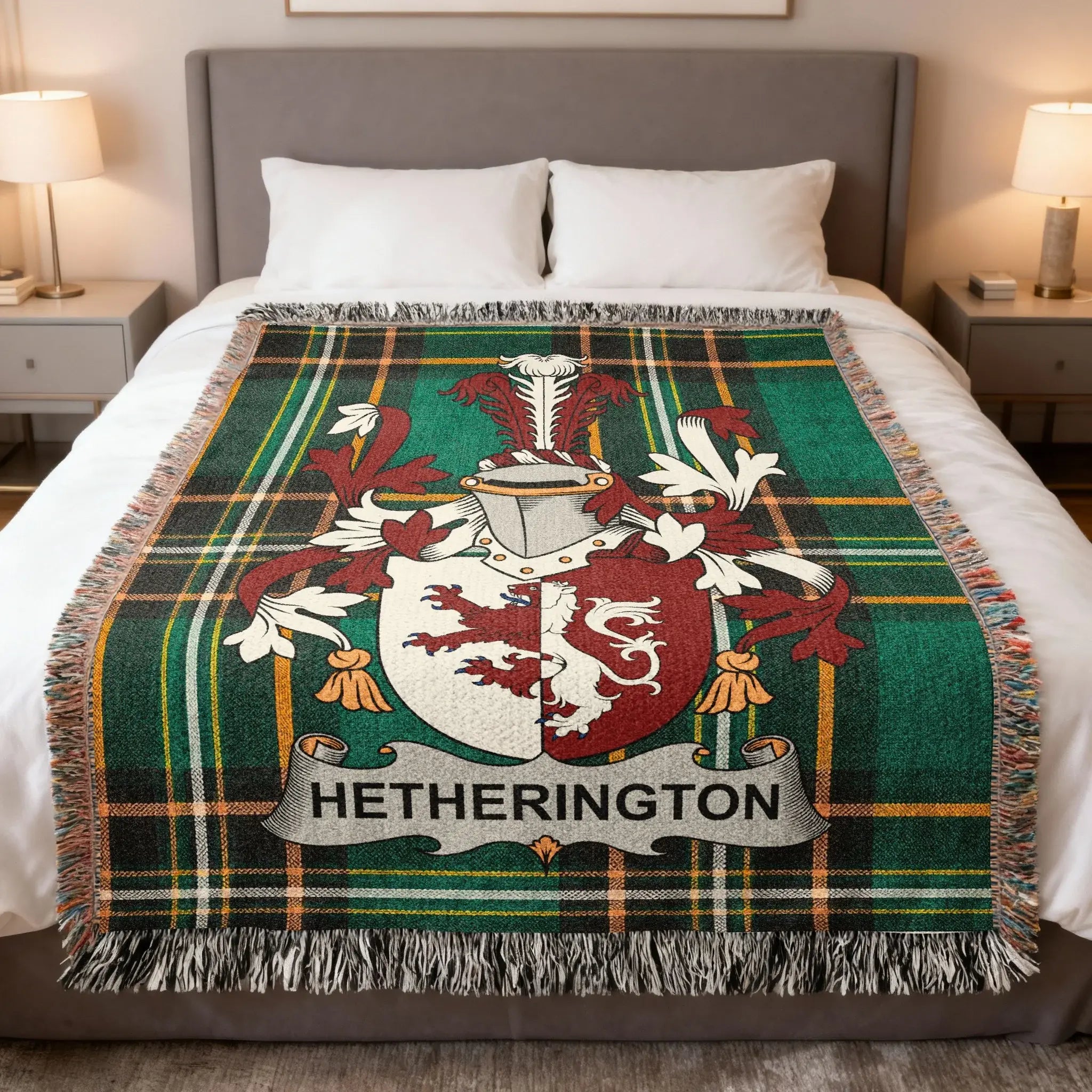 Tartan blanket with Hetherington coat of arms draped on a bed.