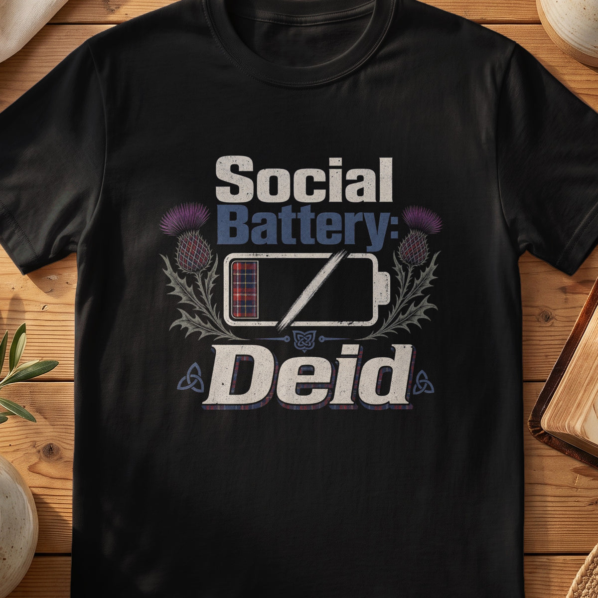 Black Gildan 64000 unisex T-shirt flatlay with Social Battery Deid Scottish graphic design