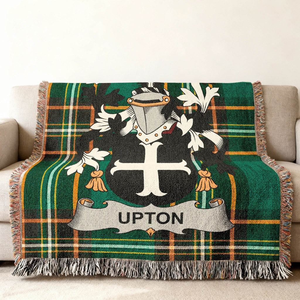 Tartan blanket featuring the Upton family crest with green, black, and white plaid.