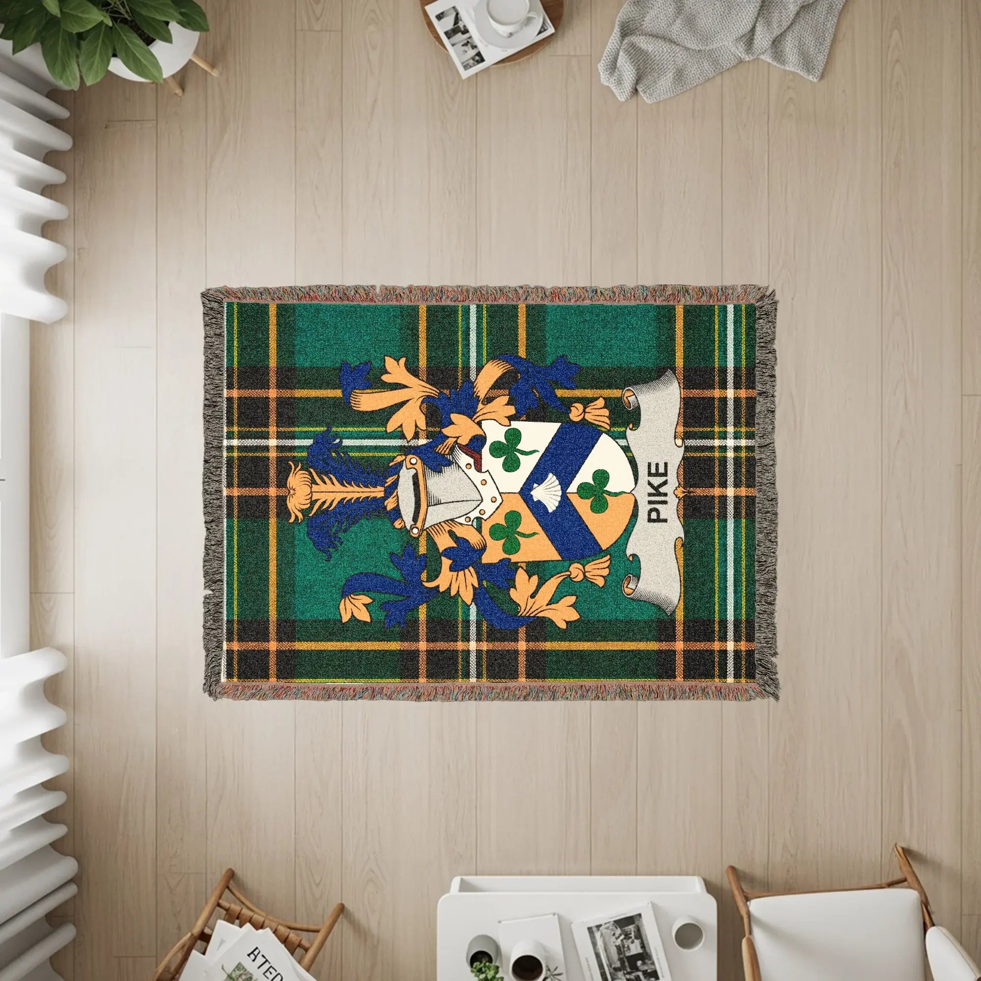 Pike family crest woven blanket with green and blue plaid background.
