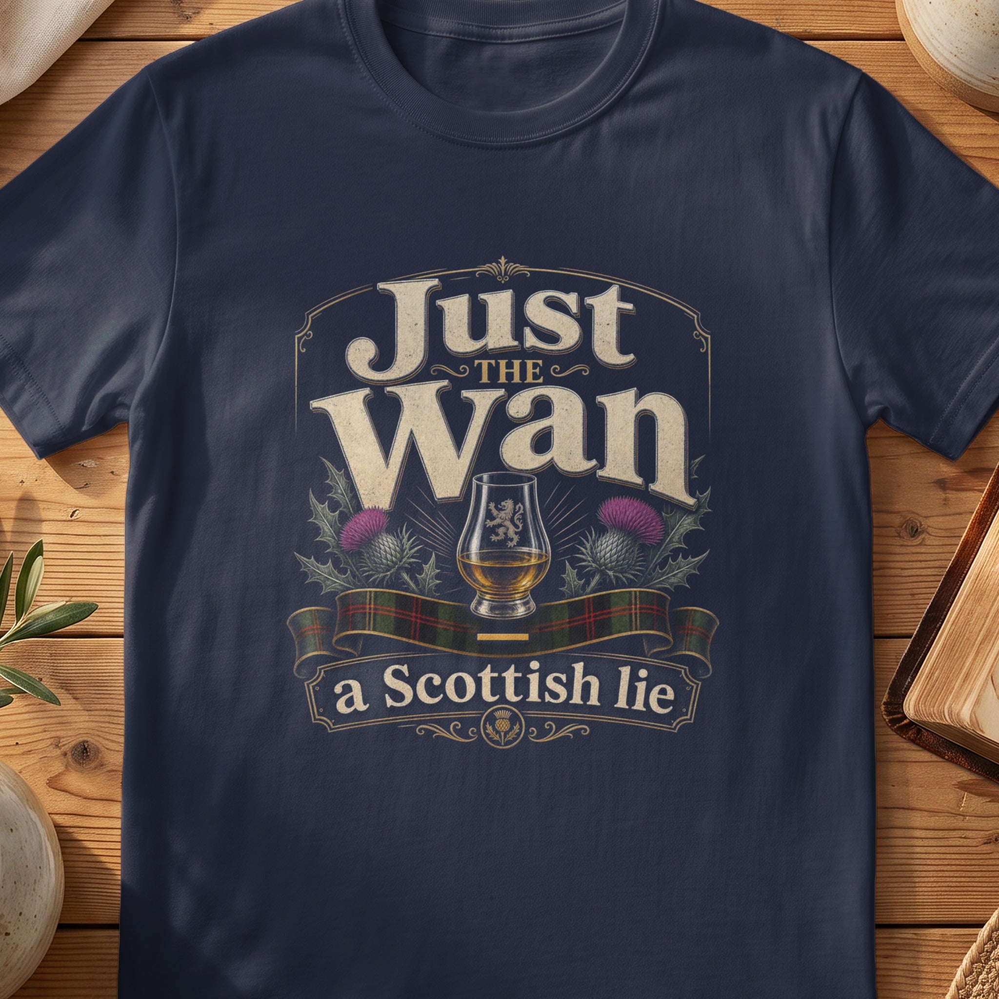 Navy Gildan 64000 unisex T-shirt flatlay with Just the Wan A Scottish Lie Scottish graphic design