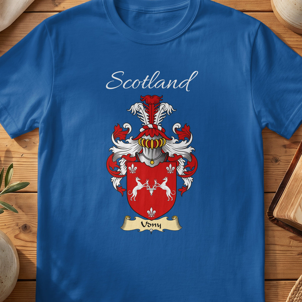 Royal blue Udny unisex heritage T-shirt with the family shield and surname design.