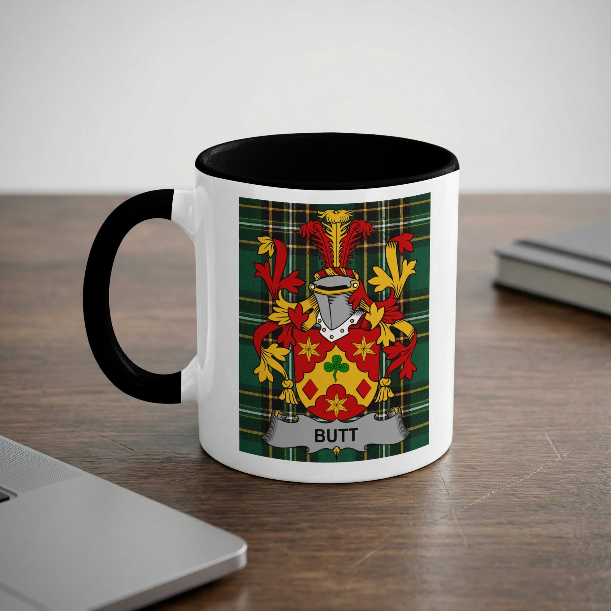 Mug with a coat of arms featuring a green plaid background and the surname "BUTT".